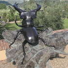 A monumental stag beetle by Anne Shingleton - bronze